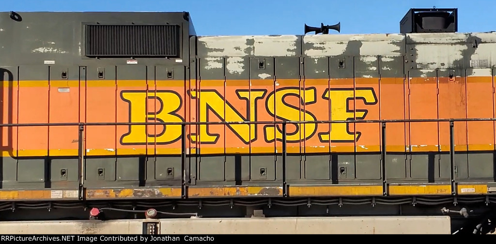 BNSF 1050, one of a kind Heritage 1 unit, trails on EB BNSF stack